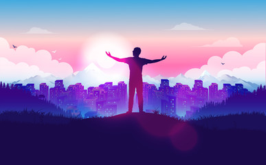 Feeling free - man standing on hill above city, with hands raised enjoying the freedom. Looking at the horizon with sunrise over cityscape, sky and clouds. Alone and happy. Embrace tomorrow concept. - obrazy, fototapety, plakaty