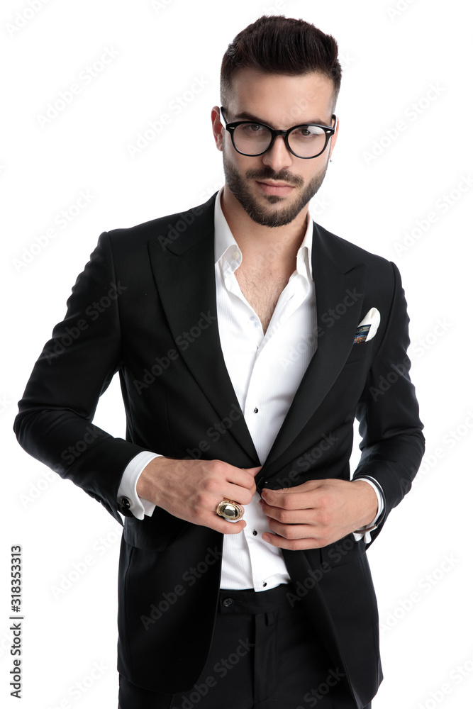 Wall mural businessman standing and opening his jacket happy