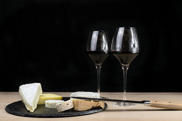 French cheese and Wine. Rosé and Bourgogne in glasses. Cheese board 