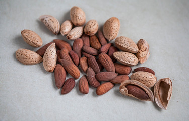 Almonds on a light background. Almond nuts.