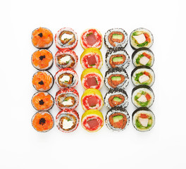 Sushi roll set isolated on white background. Top view, flat lay