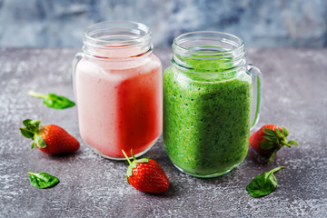 Spinach banana and strawberry smoothies in glass