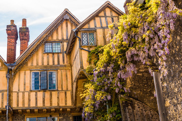 Tudor timber framed building next to The Priory Gate, Winchester, Hampshire, UK. 