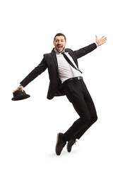 Guy in a suit dancing and singing