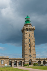 Obraz premium Beautiful lighthouse on the tip of Cap Frehel on Emerald coast of Brittany, France