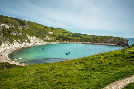 Lulworth Cove in Dorset, England, UK.