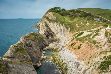 Fototapeta na wymiar Stair Hole at Lulworth Cove is dramatic coastal scenery on the Dorset Jurassic coast in England, UK.