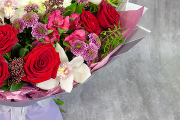 Fresh composition of bright flowers close-up work of florist decorative background