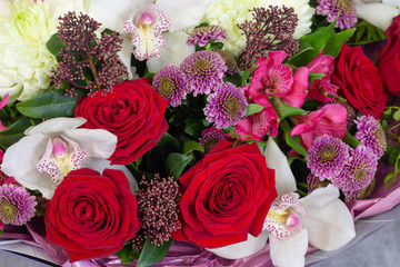 Fresh composition of bright flowers close-up work of florist decorative background