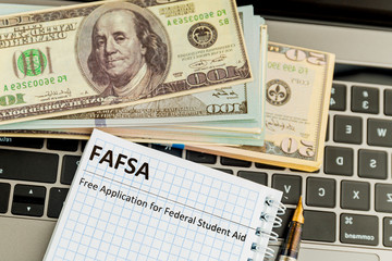 Fafsa. Student aid application form on the tablet