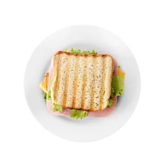Keuken spatwand met foto Lekkere sandwich met ham geïsoleerd op wit, bovenaanzicht © New Africa