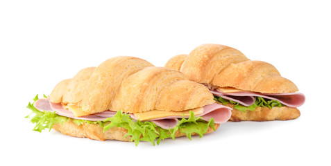 Tasty croissant sandwiches with ham isolated on white