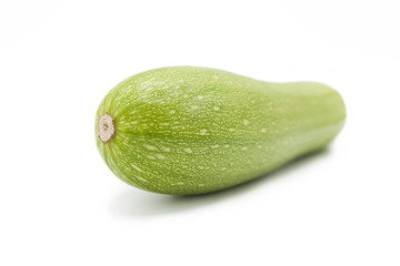 fresh organic zucchini isolated on a white background
