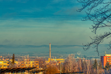 Factory chimney in eastern europe outside of town