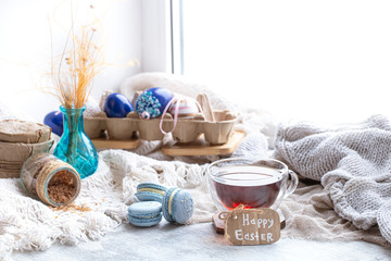 Cozy Easter still life with decor . Morning tea with dessert.