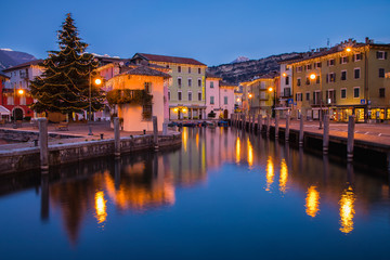 the town of Nago-Torbole on the shores of Lake Garda during Christmas time - obrazy, fototapety, plakaty