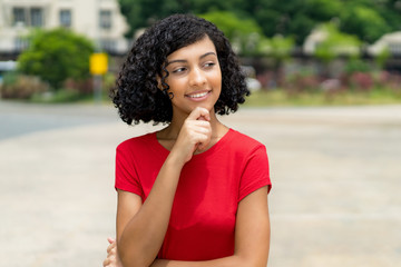 Fototapeta premium Thinking latin american woman
