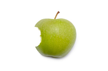 A half-eaten green apple isolated on white background.