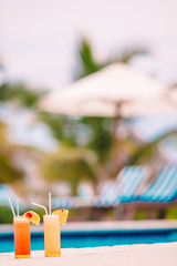 Two tasty cocktails on tropical white beach