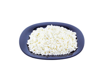 Plate with cottage cheese isolated on a white background. For design, horizontal frame