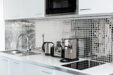 Stylish chrome kitchen interior close up a