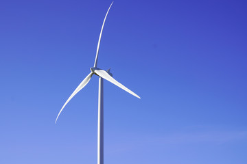 Wind turbines blue sky Energy Production with clean and Renewable Energy