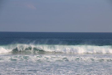waves breaking on the beach