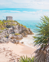 Tulum Archaeological Site and the Caribbean Ocean. Ancient Mayan pyramids located in Riviera Maya,...