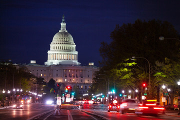 Pennsylvania Avenue traffic and lights towards United States Capitol Building home of the USA...