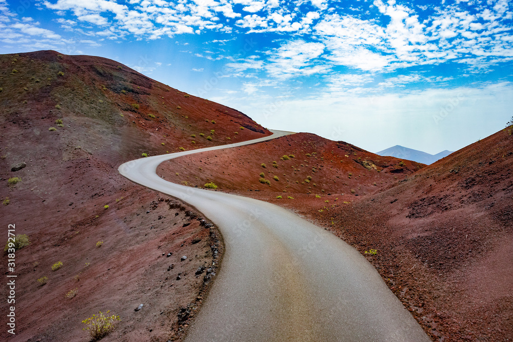 Canvas Prints image related to unexplored road journeys and adventures.road through the scenic landscape to the de