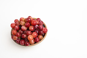 Red Grapes In Small Round Ceramic Bowl