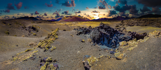 Volcanic landscape at Timanfaya National Park, Lanzarote Island, Canary Islands, Spain.Scenery mountains,volcanoes and craters in wild landscape 