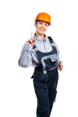 Young woman architect dancing looking at camera with a smiling facial expression.