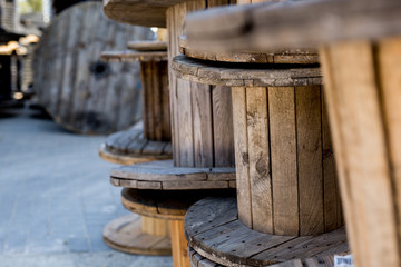 Close up shot of some big empty cable reels.