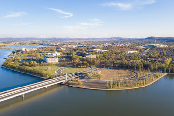 Panoramic aerial view of Lake Burley Griffin and Commonwealth Bridge in Canberra, the capital of Australia