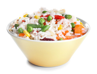 Bowl with boiled rice and vegetables on white background