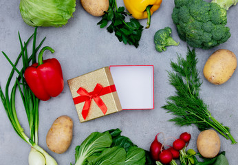 gift box and vegetables on a table.