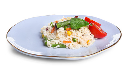 Plate with boiled rice and vegetables on white background