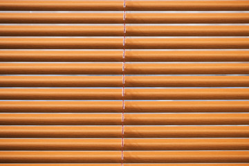 Modern blinds hanging on window