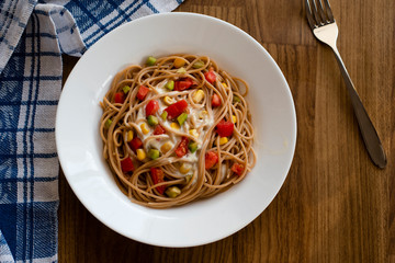Delicious vegan pasta salad with tahini dressing. Noodles with quinoa or whole wheat pasta.