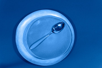 handmade ceramic plates with spoon in classic blue color