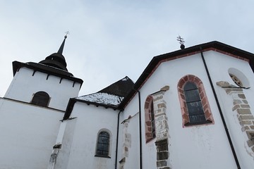 Detail of formerly early gothic catholic church in Pribylina, removed from its original position. Location northern Slovakia, during winter cloudy season. 
