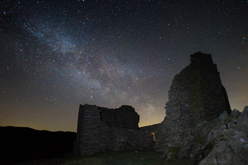 The Milky Way over a derelict old ruin