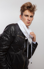 Handsome young elegant man studio portrait.