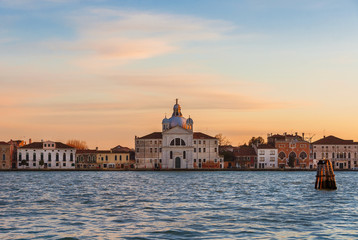 Fototapeta na wymiar Sunset view of the late renaissance Zitelle Church on Giudecca Island in Venice Lagoon