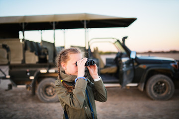 Little girl on safari © TravelPhotoBloggers