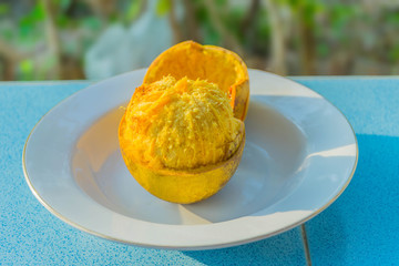 Aegle marmelos, Bael, Bael fruit, Elephant’s Apple, on the plate, local fruit in Thailand.