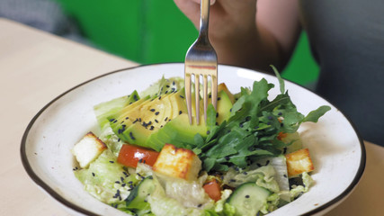 fashion food design. vegetable salad with rucolla and avocado