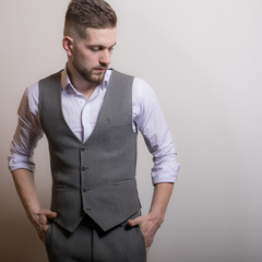 Fototapeta premium Handsome young elegant man studio portrait.