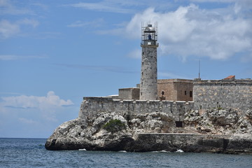 Fototapeta premium Landscape of lighthouse at el Malecon in Havana